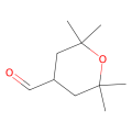 2,2,6,6-tetramethyloxane-4-carbaldehyde